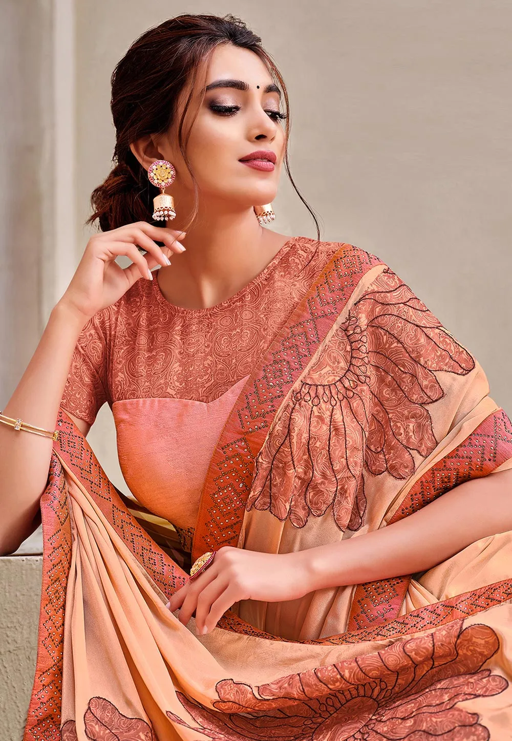 Peach Floral Motif And Stone Detailed Silk Saree