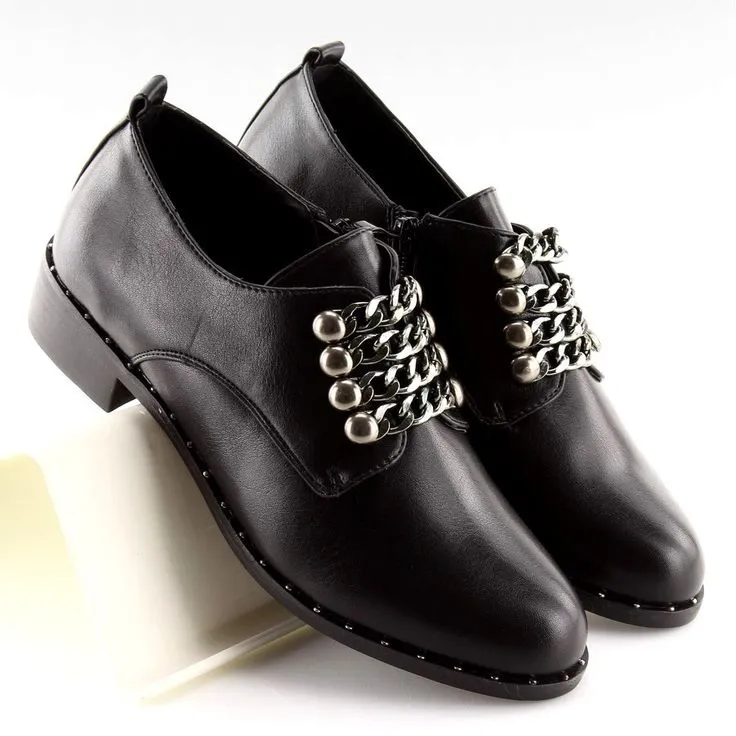 Woman's black  lace up shoes with chain frontage